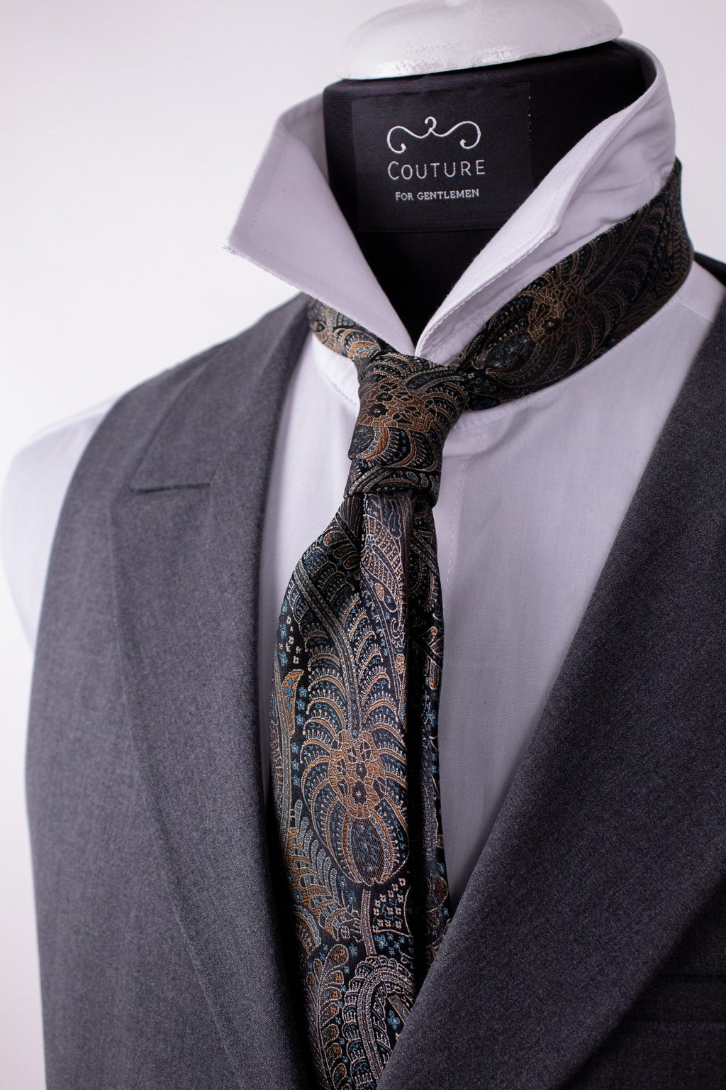 Floral pattern silk cravat for men, natural silk fabric, elegant accessory for formal wear.
