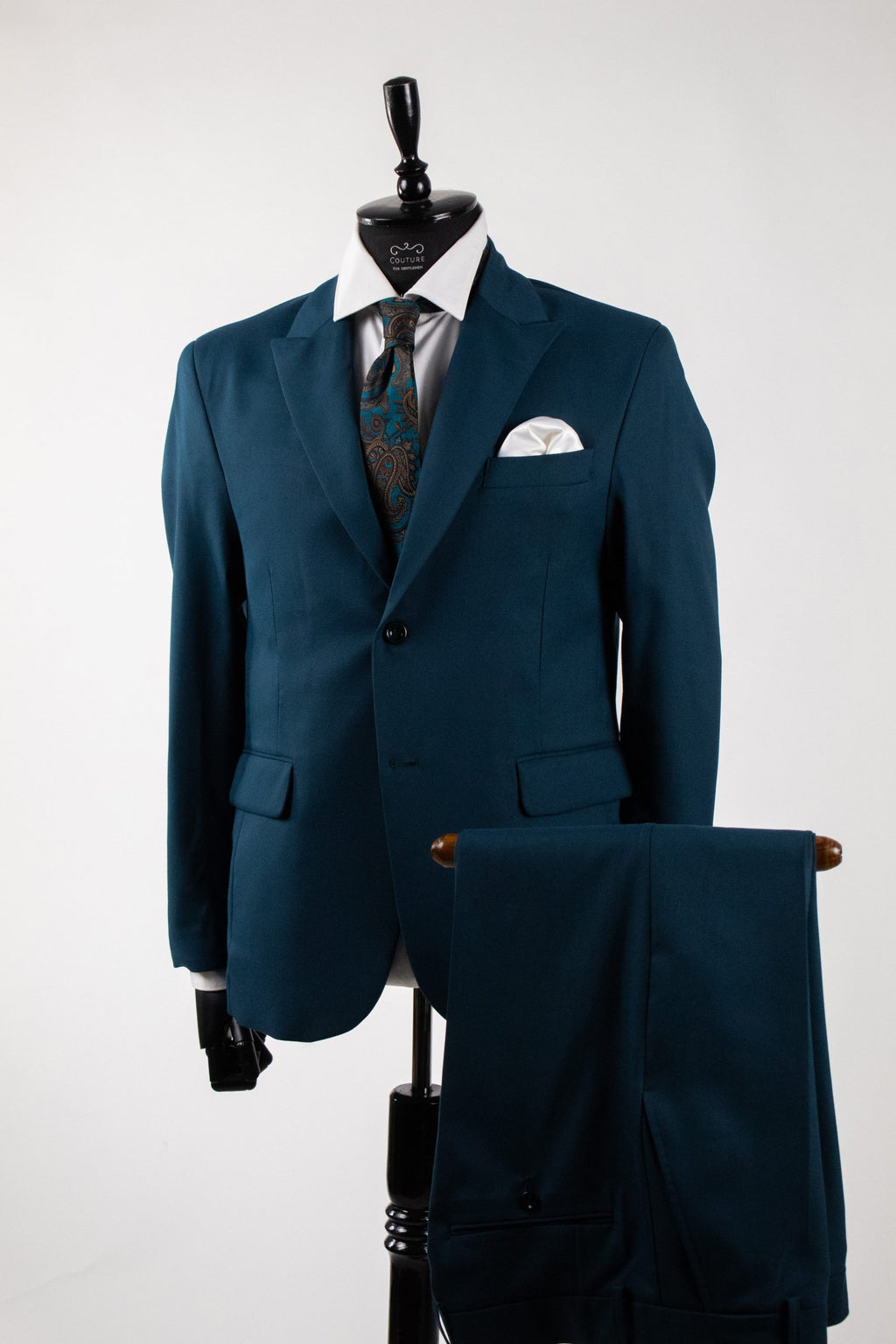 Emerald green Santorini costume by Couture for Gentlemen, featuring detailed fabric and tailored fit for formal occasions.