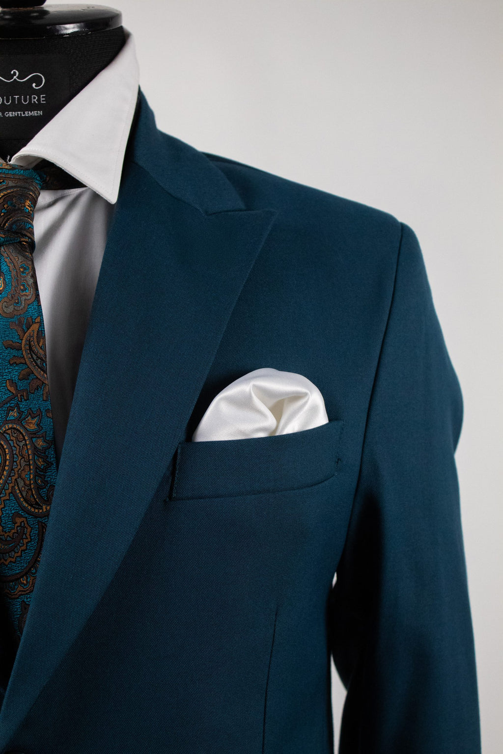 Emerald green Santorini costume by Couture For Gentlemen, featuring a tailored fit and stylish design.