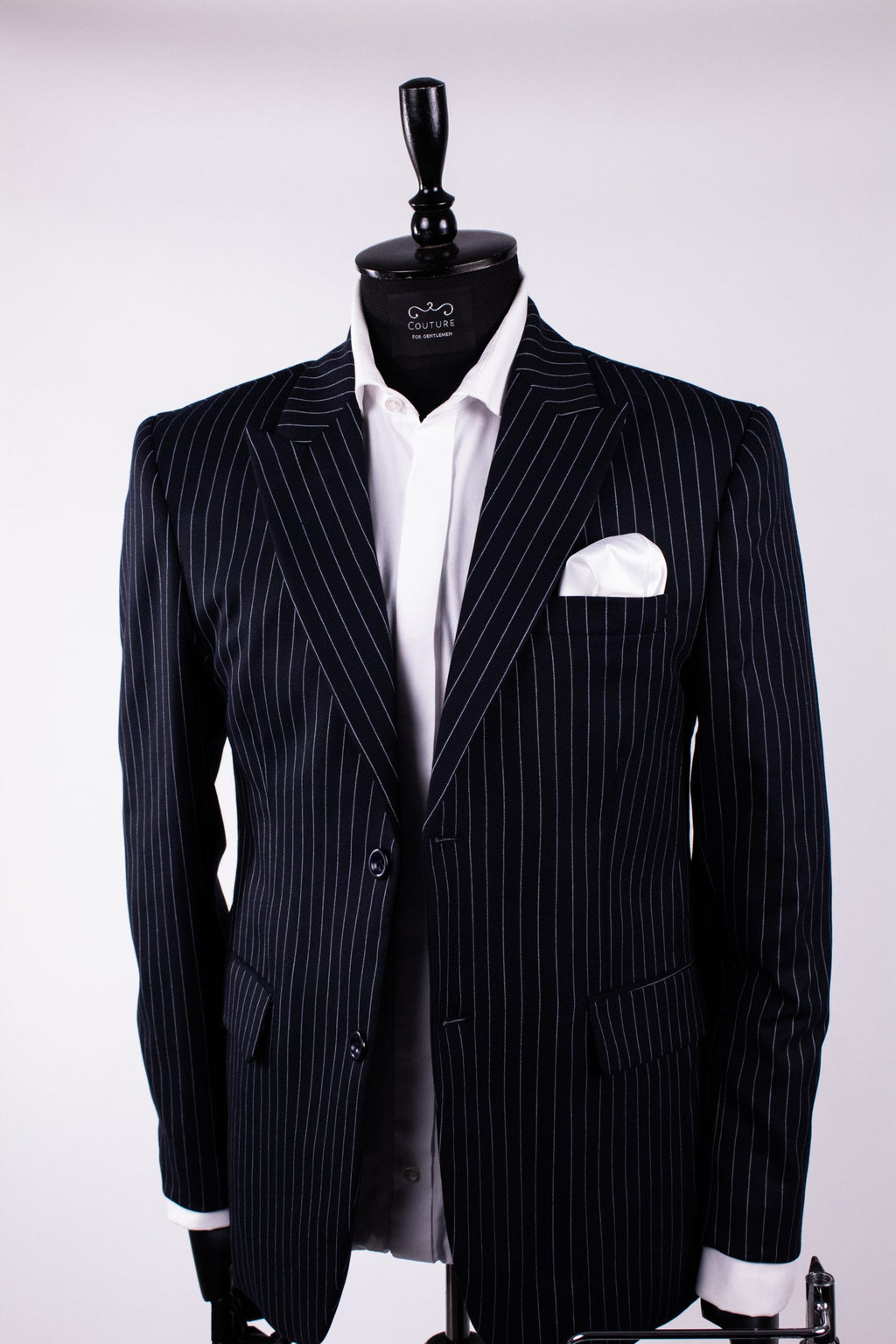 Navy striped costume blazer by Couture for Gentlemen, featuring tailored fit and classic design, shown on a mannequin.