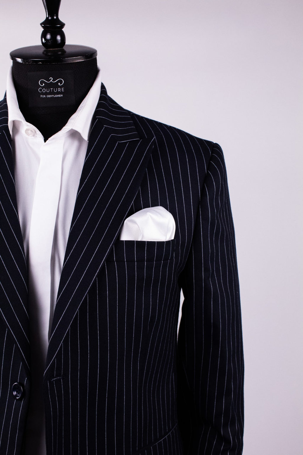 Navy striped costume blazer by Milano CFG10, tailored fit with classic blue and white pinstripes for men's formal wear.